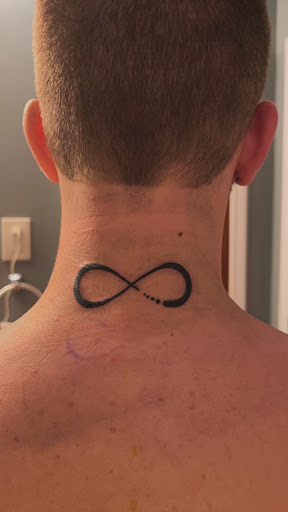 Explore black queen tattoo ideas, creative tattoo ideas in Worcester, available at Elegance Piercing & Tattoo Inc.