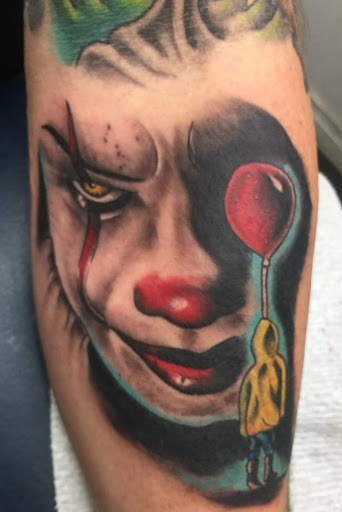 Explore fear god tattoo ideas, creative tattoo ideas in Savannah, available at Tattoo Addictions