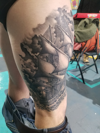 Explore unique sleeve tattoo ideas, creative tattoo ideas in Houston, available at Los Muertos Tattoo Studio and Art Gallery