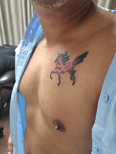 Explore dinosaur tattoo ideas, creative tattoo ideas in Huntsville, available at FN Classy Tattoo Body Piercing