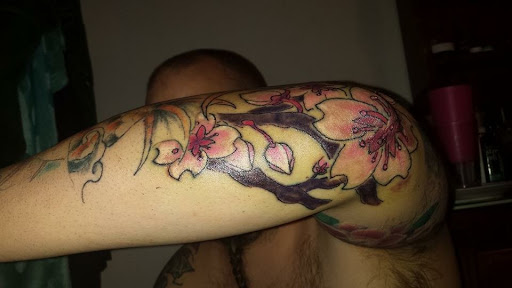 Explore patriotic sleeve tattoo ideas, creative tattoo ideas in Allentown, available at Critical Acclaim Tattoos