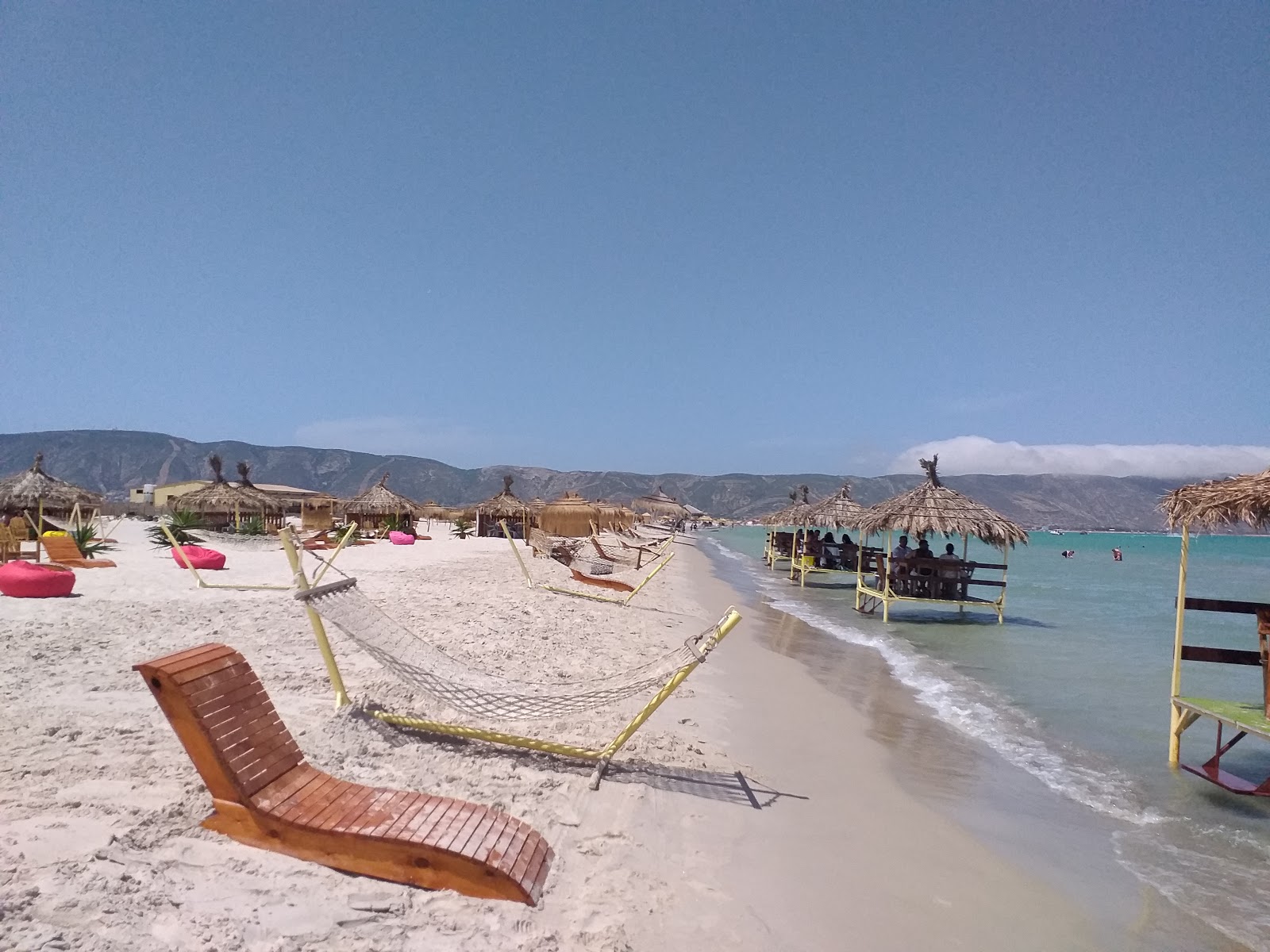 Foto van Coco Beach utique met helder fijn zand oppervlakte