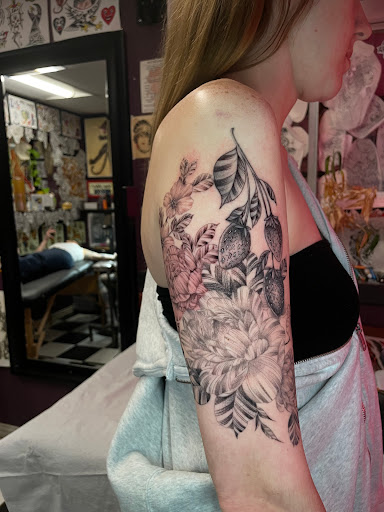 Explore neck tattoo ideas for guys, creative tattoo ideas in Georgetown, available at Iron Rite Tattoo South