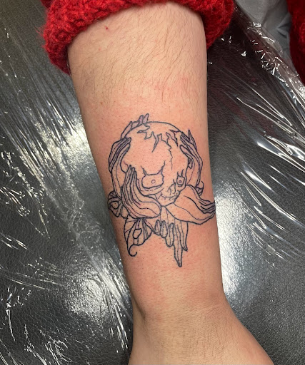 Explore racoon tattoo ideas, creative tattoo ideas in Marietta, available at The Queen Bee Tattoo and Piercing Parlour