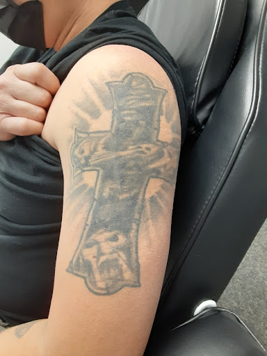 Explore pansy tattoo ideas, creative tattoo ideas in Saint Paul, available at Fearless Tattoo Removal