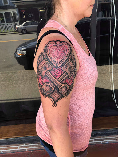 Explore belly button tattoos ideas, creative tattoo ideas in Tacoma, available at Garfield Street Tattoo Co