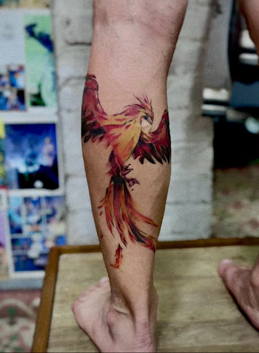 Explore dinosaur tattoo ideas for son, creative tattoo ideas in Melbourne, available at Reef Side Tattoo Melbourne Tattoo Shop