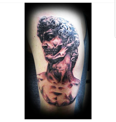 Explore leg tattoo idea, creative tattoo ideas in Ambler, available at Tattoo GalaxyAmbler Piercing & Custom Tattoos