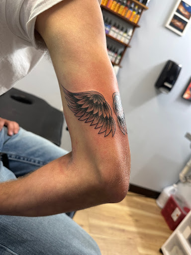 Explore gun tattoo ideas, creative tattoo ideas in Whitehall, available at Beachside Tattoos & Smoke Shop