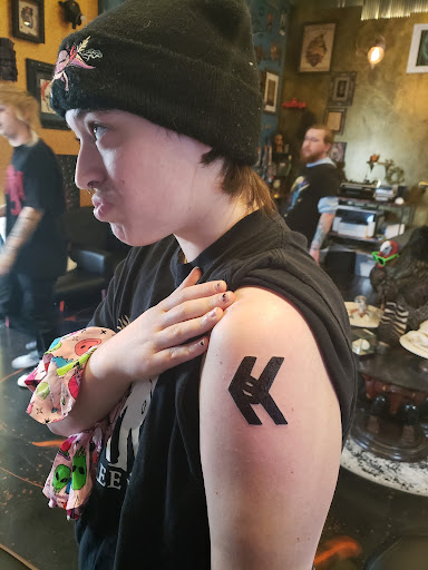Find gym tattoo ideas for men for your next unique tattoo in Fremont at Eternal Tattoo And Body Piercing