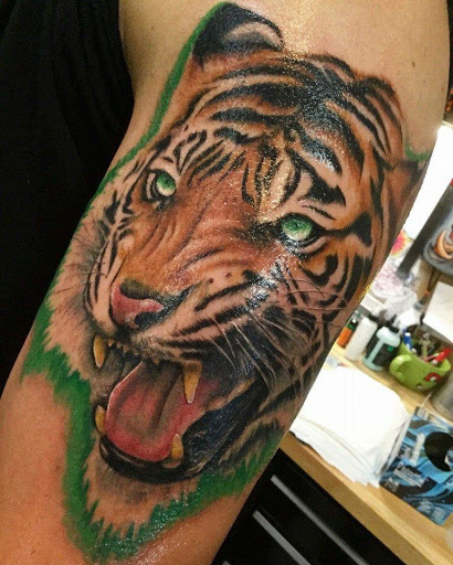 Explore e.t. tattoo ideas, creative tattoo ideas in Titusville, available at Davinci Tattoo