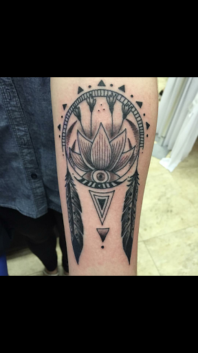 Explore haunted tattoo ideas, creative tattoo ideas in Taos, available at Magical Tattoo