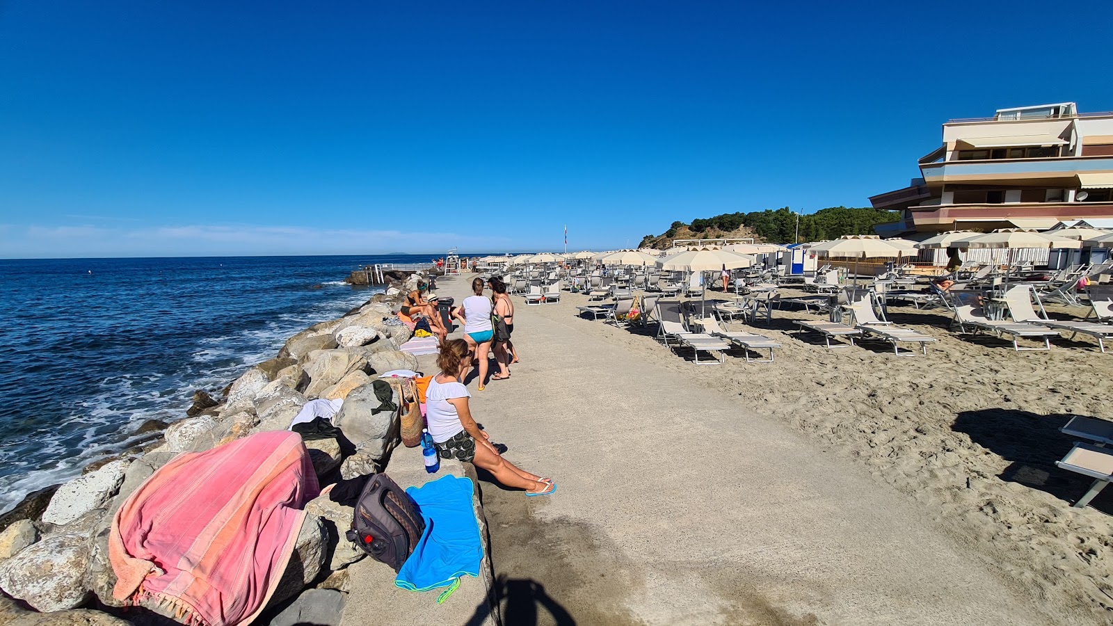 Fotografija Porticciolo del Chioma z majhni več zalivi