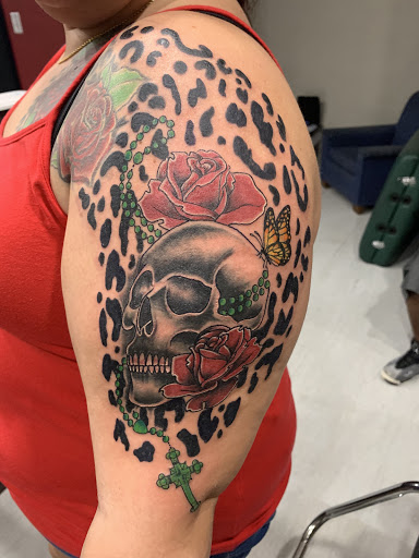 Explore tattoo ideas for back of the neck, creative tattoo ideas in Cape Coral, available at UNRIVALED INK