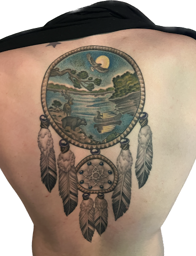 Explore tattoo ideas for upper back, creative tattoo ideas in Toledo, available at Meraki Tattoo