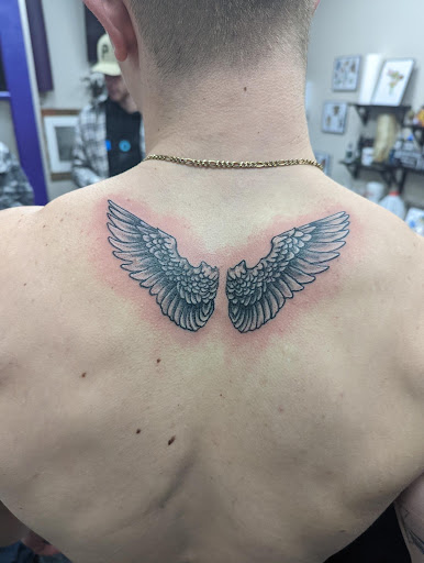 Explore open heart surgery tattoo ideas, creative tattoo ideas in Slippery Rock, available at Dinky Dachshund Tattoo Parlor