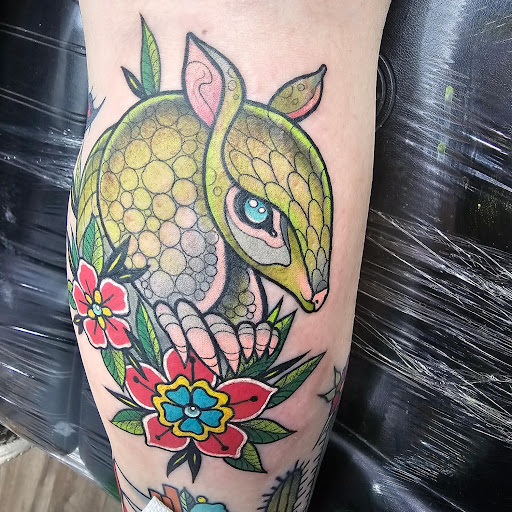 Explore beauty and the beast tattoo ideas, creative tattoo ideas in Cheyenne, available at The T.R.I.B.E. Zoo, LLC Tattoo