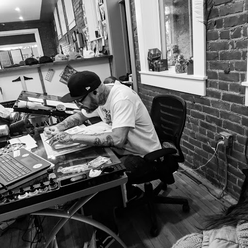 Tattoo Shop «The Shop», reviews and photos, 141 S Grand Ave, Fowlerville, MI 48836, USA