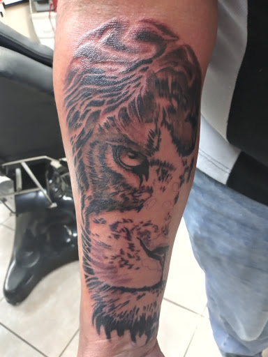 Explore old english tattoo ideas, creative tattoo ideas in Clearwater Beach, available at Psychotic Ink