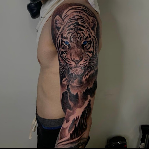 Explore caterpillar tattoo ideas, creative tattoo ideas in Woodhaven, available at 94 Ink Tattoos