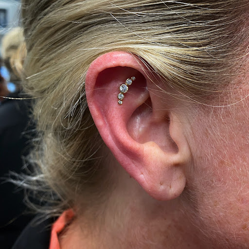 Explore laugh now cry later tattoo ideas, creative tattoo ideas in Cary, available at Fine Art Body Piercing By Lilith Mae