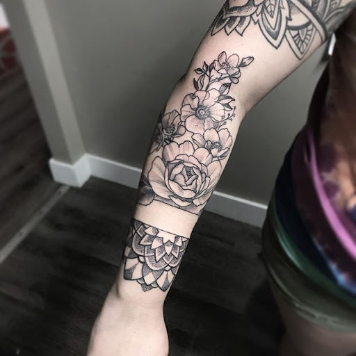 Explore tribal half sleeve tattoo ideas, creative tattoo ideas in Hampstead, available at Lost Soul Collective
