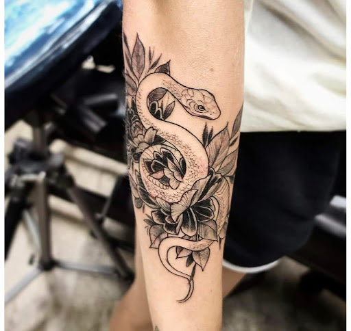 Explore rip ideas for tattoos, creative tattoo ideas in Kenosha, available at Kenosha Tattoo Company