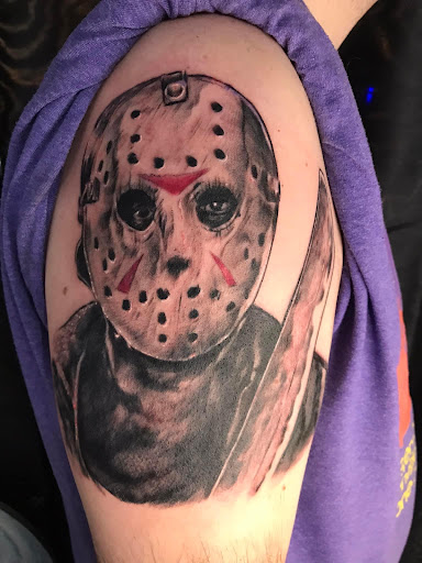 Explore black power tattoo ideas, creative tattoo ideas in Newport, available at Bay View Tattoo