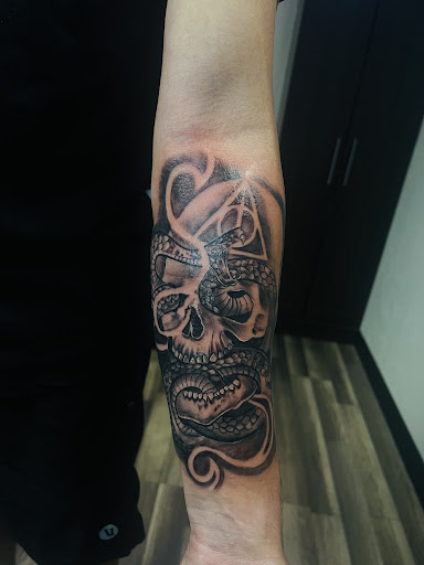 Explore mens hand tattoo ideas, creative tattoo ideas in Glendale, available at Urban Legends Tattoo and Piercing LLC