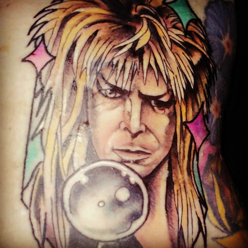 Explore blue rose tattoo ideas, creative tattoo ideas in Springfield, available at Area 51 Tattoo