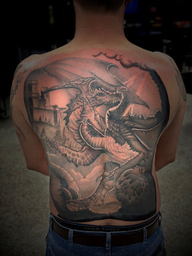 Explore lotus tattoo ideas, creative tattoo ideas in Smithville, available at Sanctioned Arts Tattoo Co.