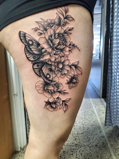 Explore elbow tattoo ideas traditional, creative tattoo ideas in Wisconsin Dells, available at Twisted Dimensions Tattoo Studio