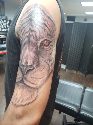 Explore nepali tattoo ideas, creative tattoo ideas in Jacksonville, available at Fat Kat Tattoo & Body Piercing