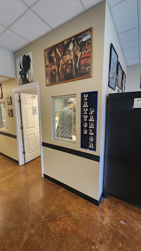 Find tummy tuck scar tattoo ideas for your next unique tattoo in Houma at New Era Tattoo Studio