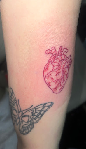 Explore tattoo flag ideas, creative tattoo ideas in San Antonio, available at Wicked Ways Tattoos - Babcock