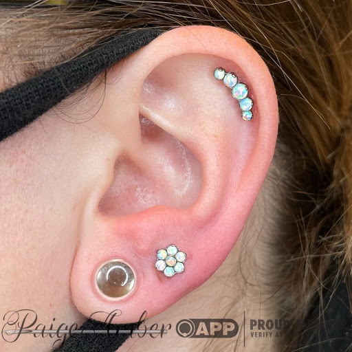 Explore aquarius tattoo ideas for men, creative tattoo ideas in Oshkosh, available at Piercings by Paige at Big Guns Tattoo