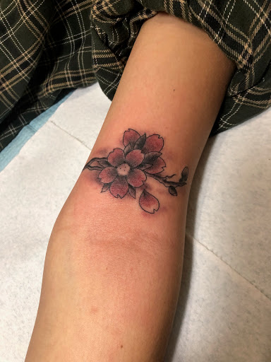 Explore thigh tattoo ideas woman, creative tattoo ideas in Frisco, available at Frisco Tattoo Company - Steel PaintBrush