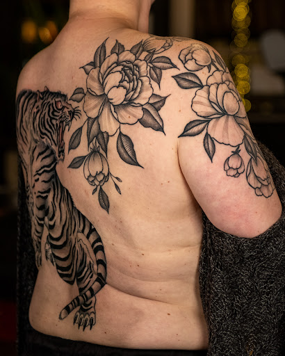 Explore photography tattoo ideas, creative tattoo ideas in Vancouver, available at Hopeless Tattoo & Piercing