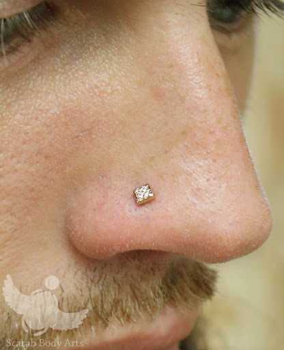 Explore family over everything tattoo ideas, creative tattoo ideas in Syracuse, available at Scarab Body Arts