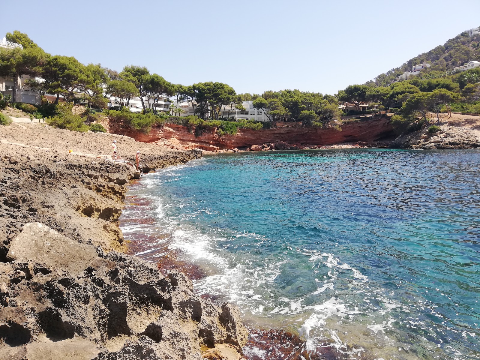 Foto di Cala Marmassen con una baia minuscola 
