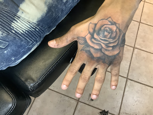 Explore butterfly wrist tattoo ideas, creative tattoo ideas in Whitehall, available at Beachside Tattoos & Smoke Shop