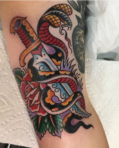 Explore illuminati tattoo ideas, creative tattoo ideas in Sacramento, available at American Graffiti Tattoo & Piercing