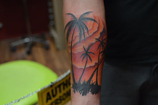 Explore thigh tattoo ideas male, creative tattoo ideas in West Palm Beach, available at GURU Tattoo & Piercing - Palm Beach County