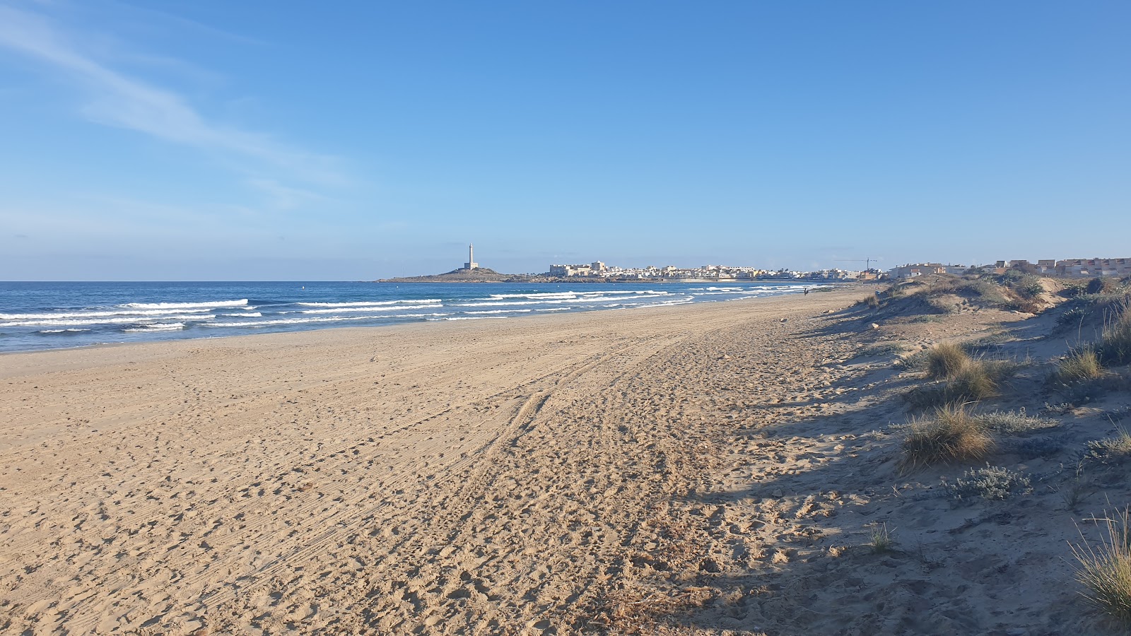 Foto von Playa de las Amoladeras mit beiger sand Oberfläche