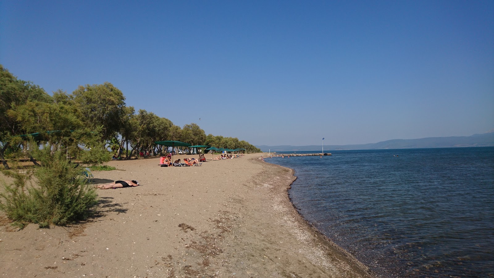 Foto van Kalloni beach II met helder zand oppervlakte
