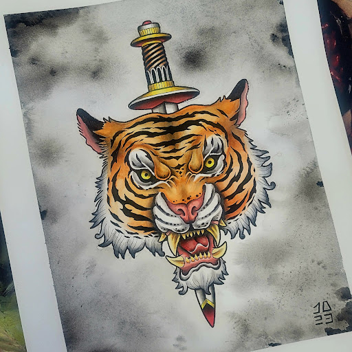 Explore snake tattoo ideas, creative tattoo ideas in Painesville, available at The Inkwell Tattoo Company