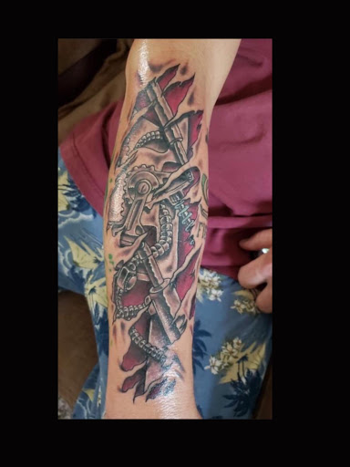 Explore locket tattoo ideas, creative tattoo ideas in Greenfield, available at Tattoos In Time Studio