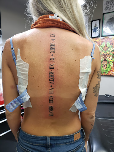 Explore wedding band tattoo ideas, creative tattoo ideas in Linn Creek, available at Hillard Skillard Tattoos, LLC.