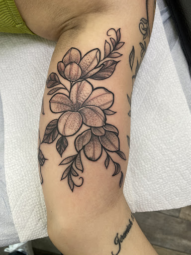 Explore tattoo ideas for legs, creative tattoo ideas in Valrico, available at Fine Ink Studios Tattoos