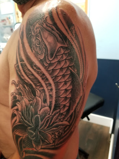 Tattoo Shop «Highlander Tattoo», reviews and photos, 4516 Curry Ford Rd, Orlando, FL 32812, USA